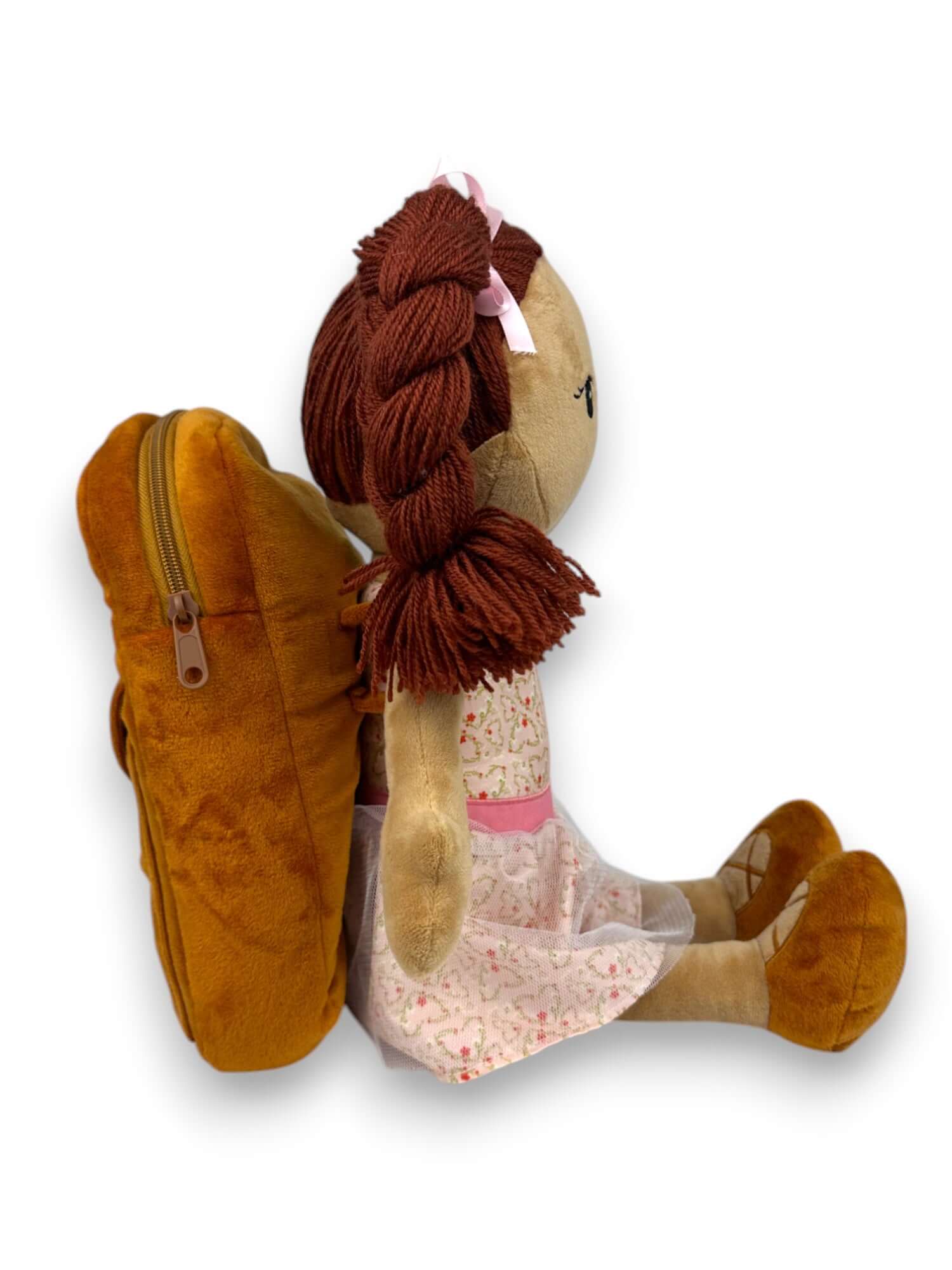 Journal Jasmine doll with brown hair and dress sitting beside a plush backpack, promoting self-worth and journaling.
