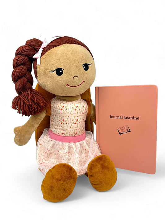 Journal Jasmine doll with pink journal encourages self-worth and emotional expression in kids.